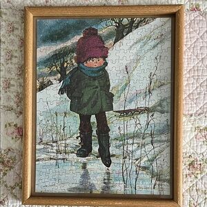 Vintage wood framed puzzle. Approx 14.5” x 11.5”. Winter scene of boy by a pond.